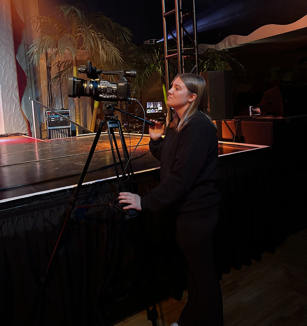 Intern Grace working the camera